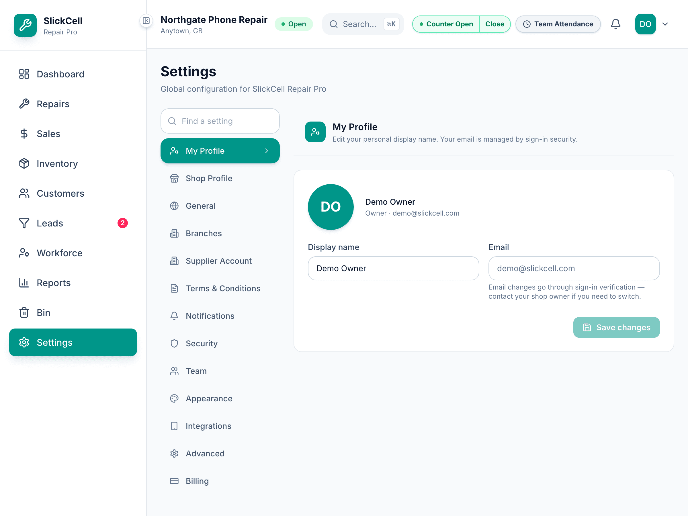 The team settings listing staff with their roles and the control to invite someone.